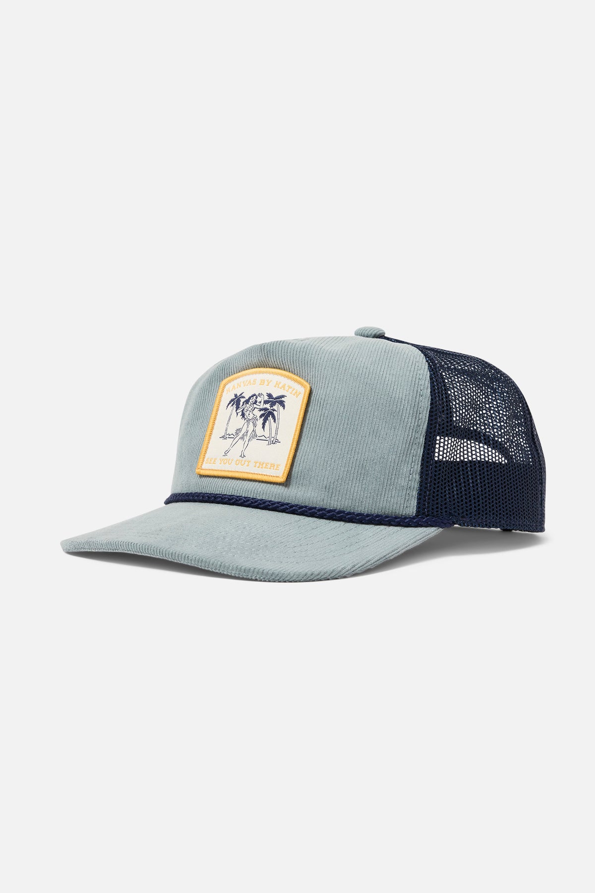 corduroy and mesh trucker hat in blue with a patch featuring a hula girl