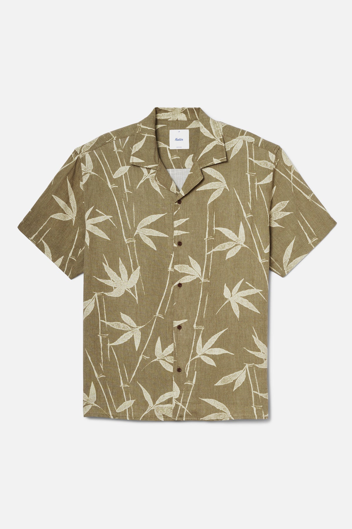 Moss colored shirt with bamboo pattern on a white background