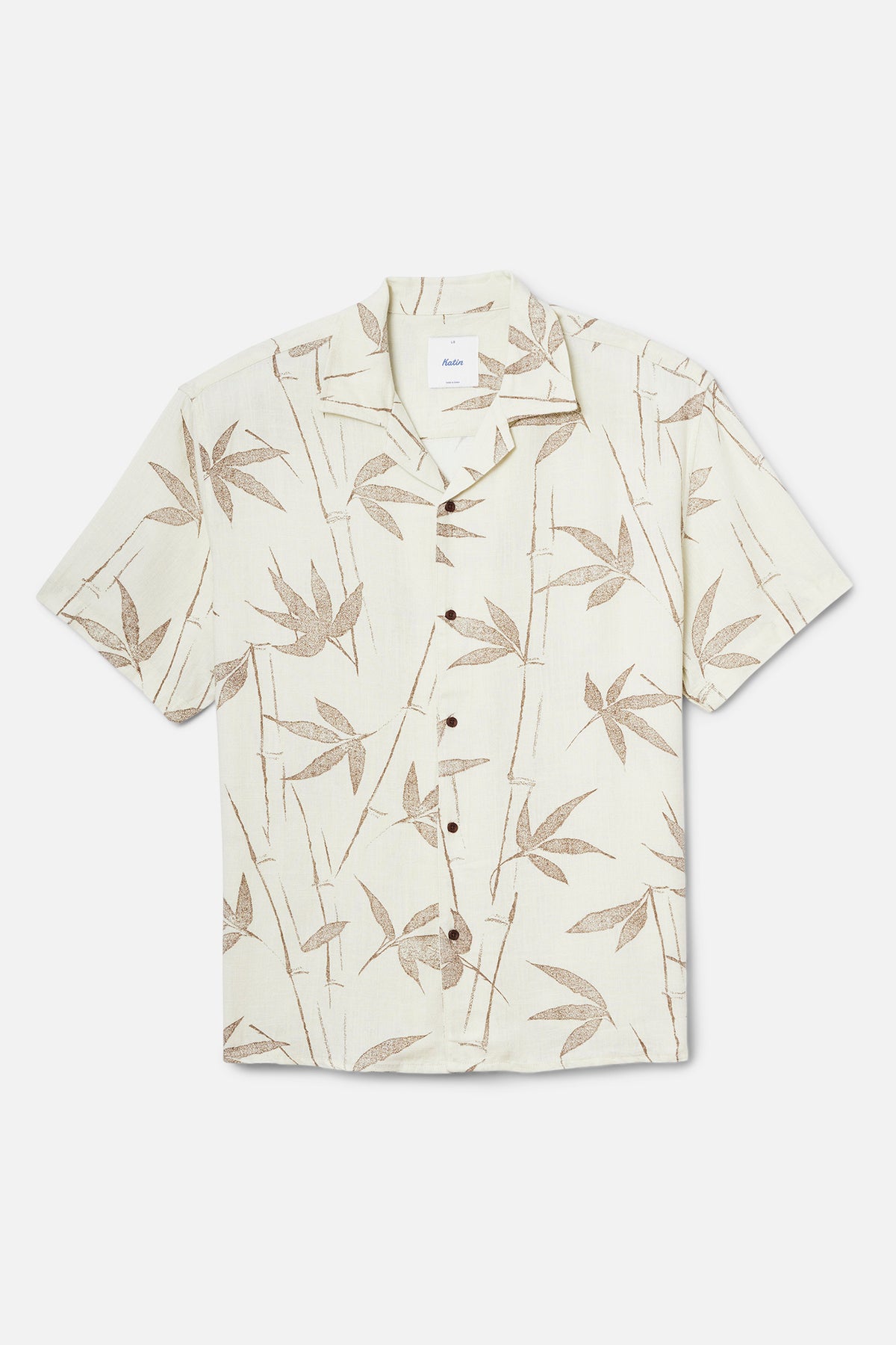 off white shirt with gold bamboo pattern on a white background