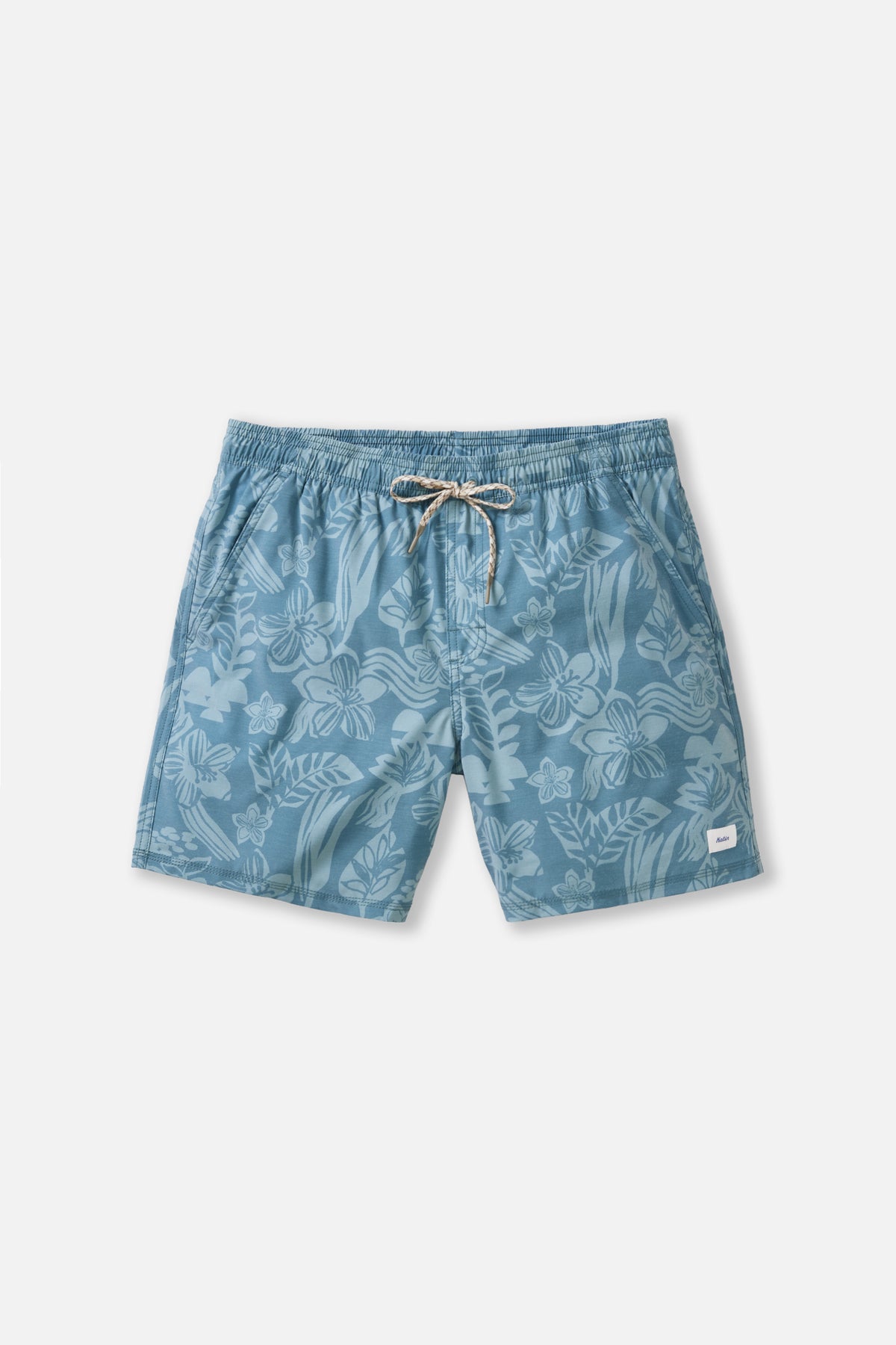 Blue patterned shorts on a light gray background
