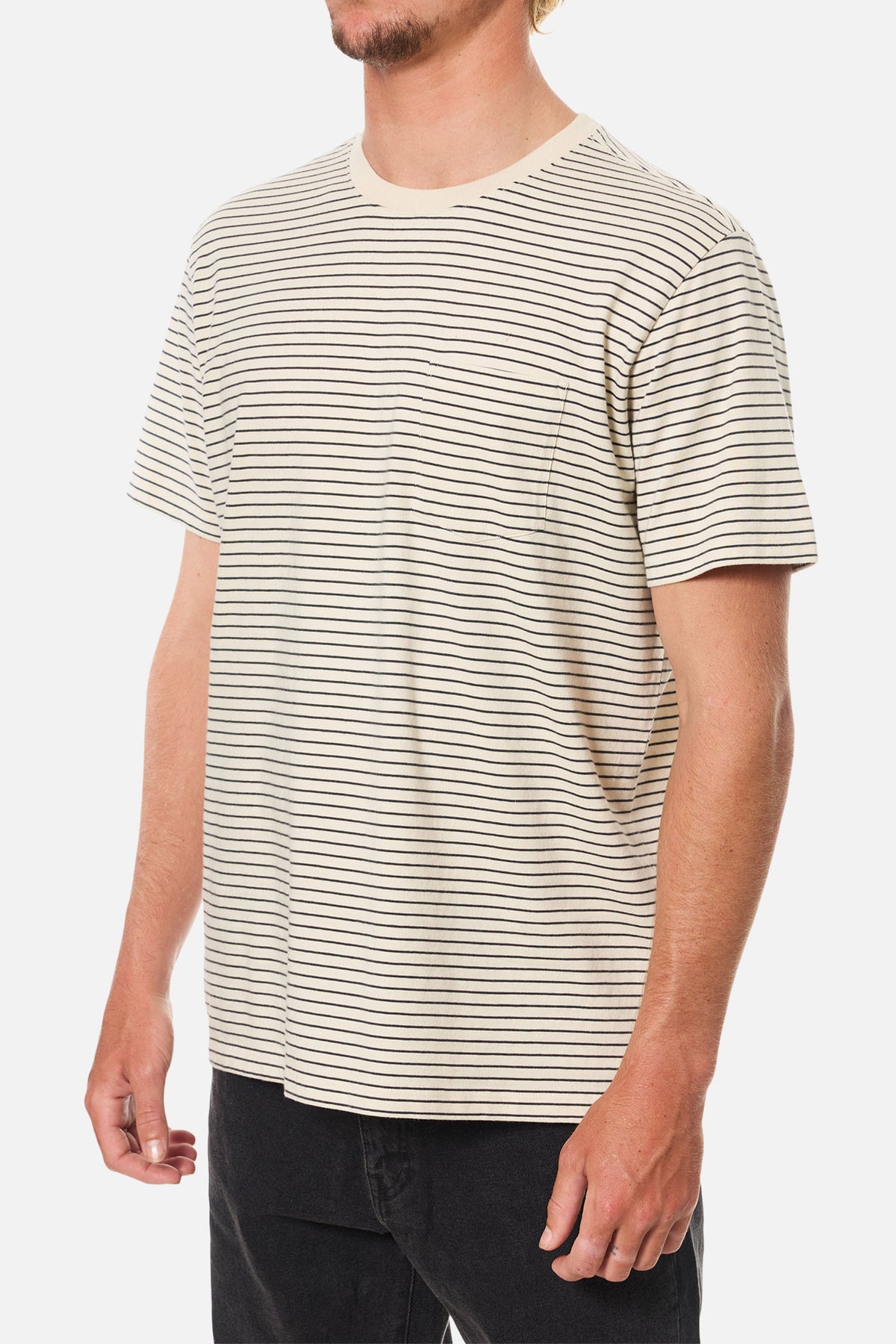 Man wearing a striped t-shirt on a plain background