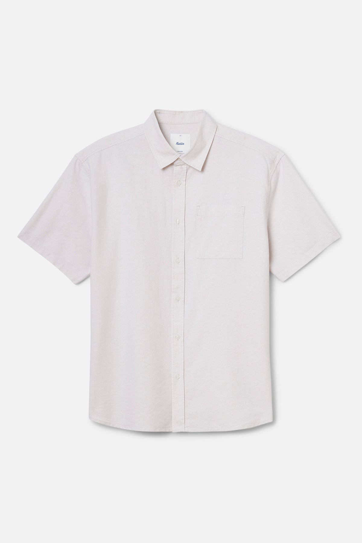 White short-sleeve shirt on a light gray background