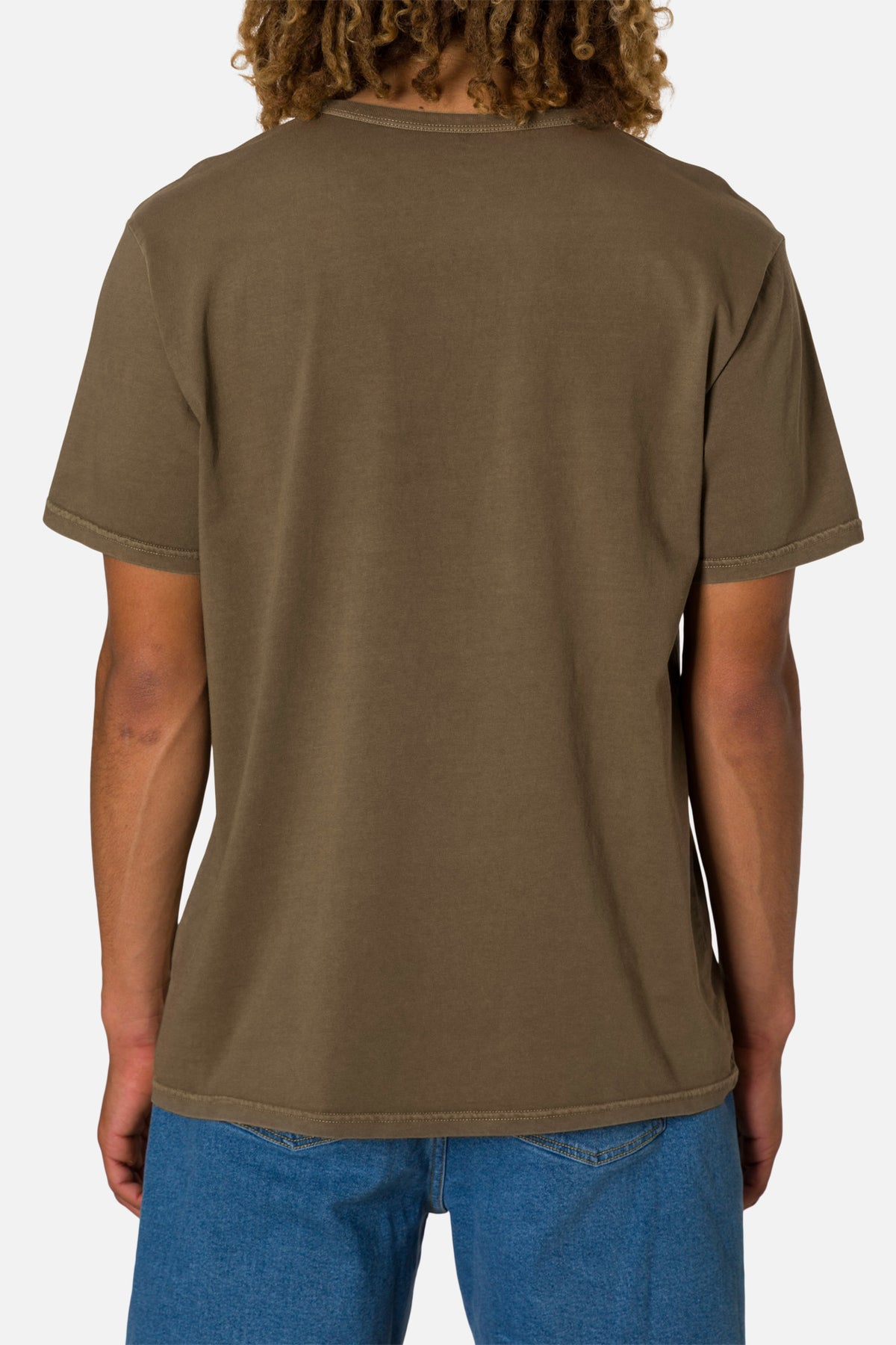 Person wearing a brown t-shirt on a white background