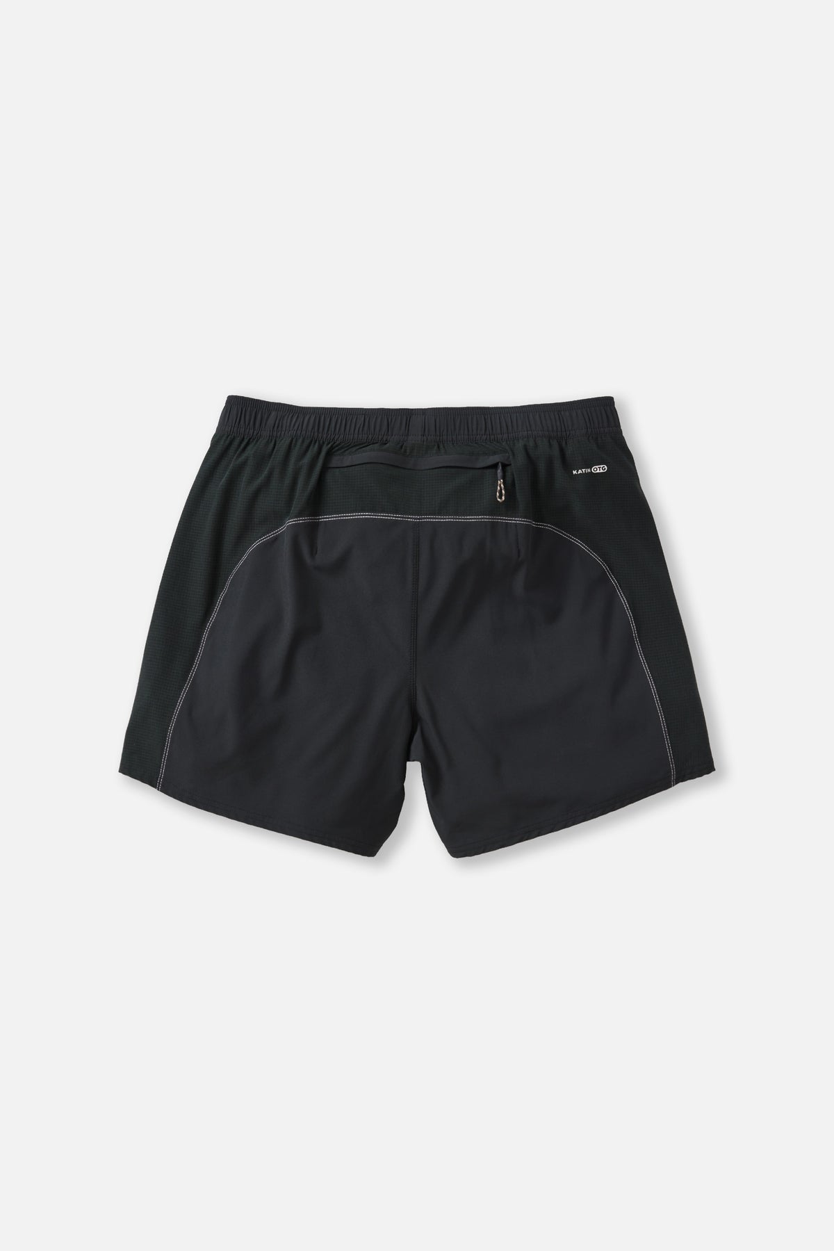 Black athletic shorts with a subtle design on a light gray background