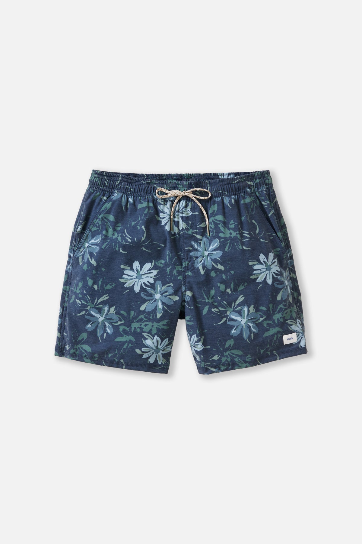 Navy blue floral-patterned shorts on a light gray background