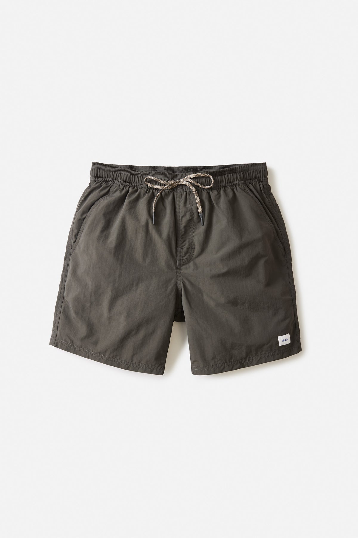 A pair of blackwash nylon volley shorts with an elastic waistband and drawstring, featuring front slash pockets and a small logo on the left leg.