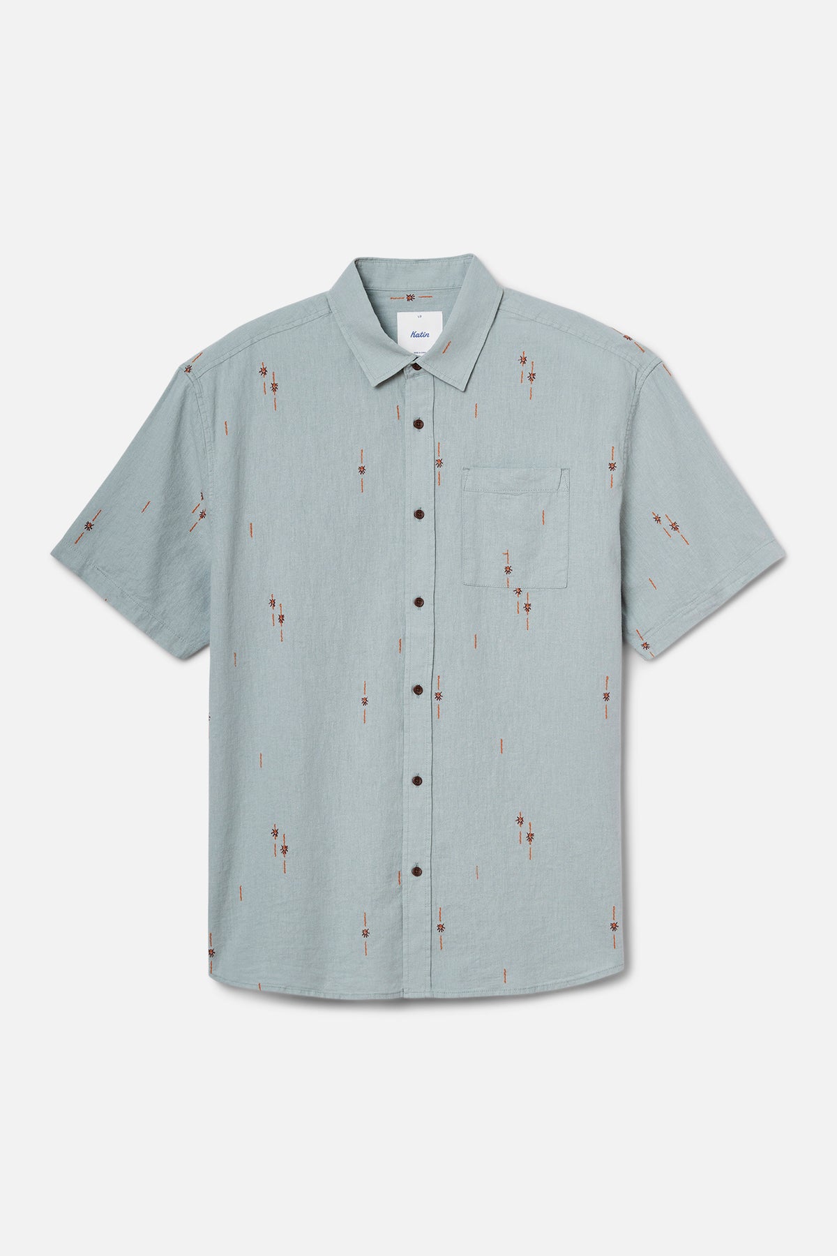 Light blue shirt with subtle pattern on a white background