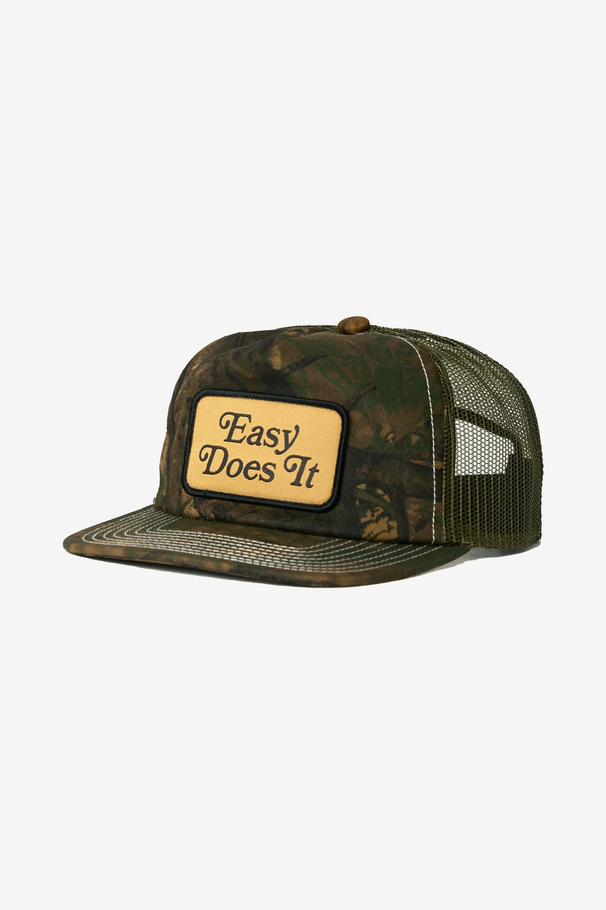 Camouflage cap with 'Easy Does It' patch on a white background