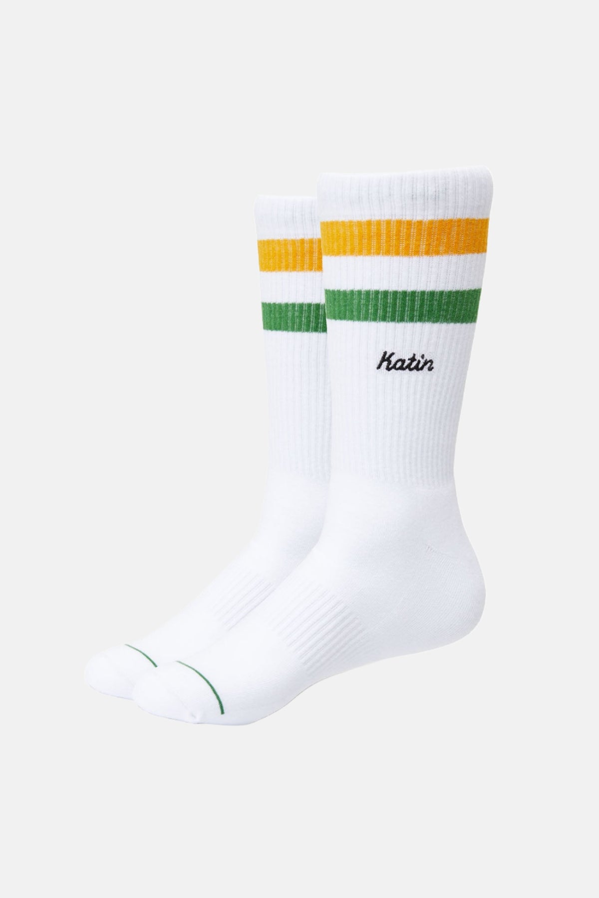 white socks with green and yellow stripe