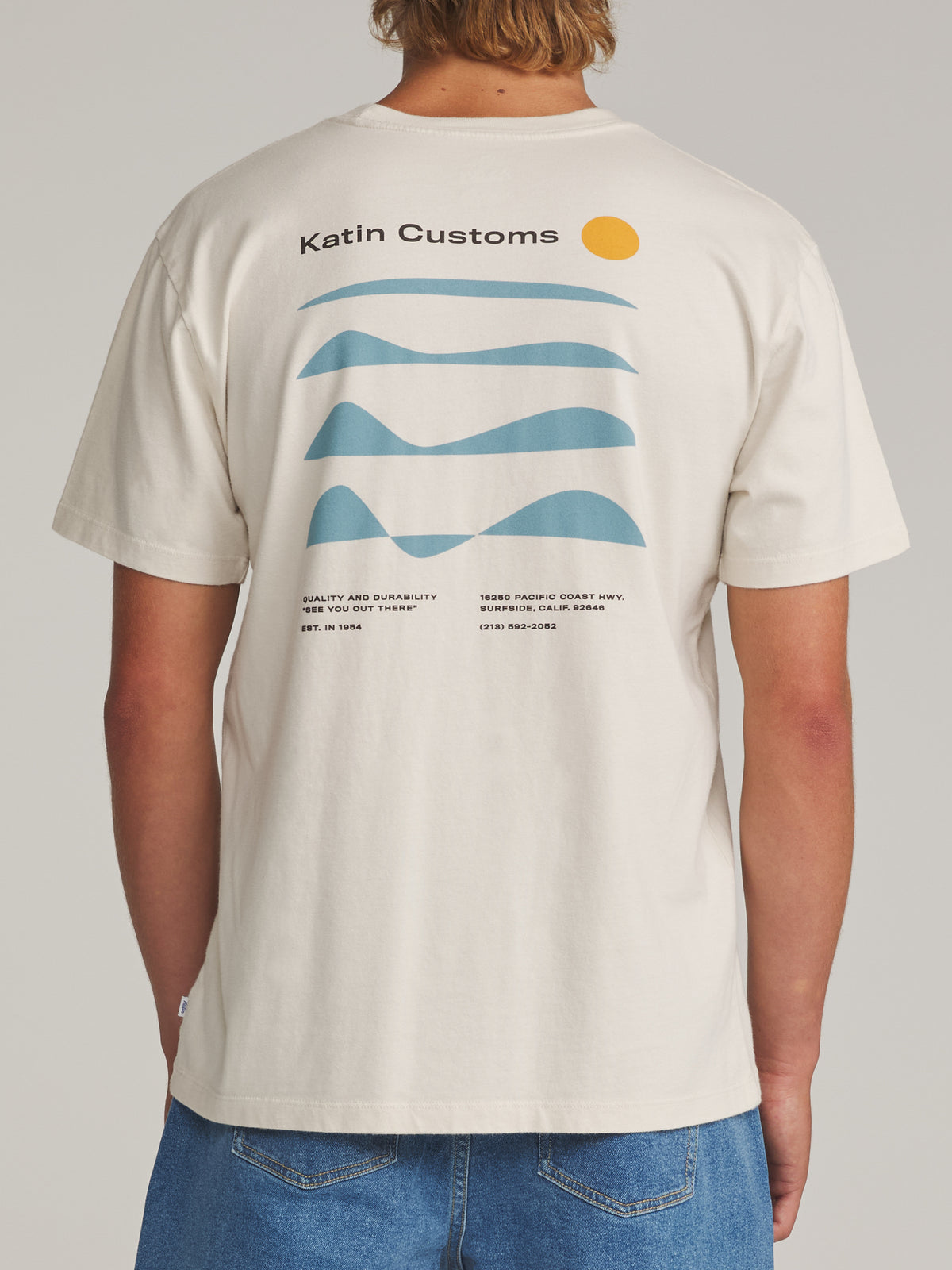 Katin Frequency Tee in Vintage White - worn on model, back