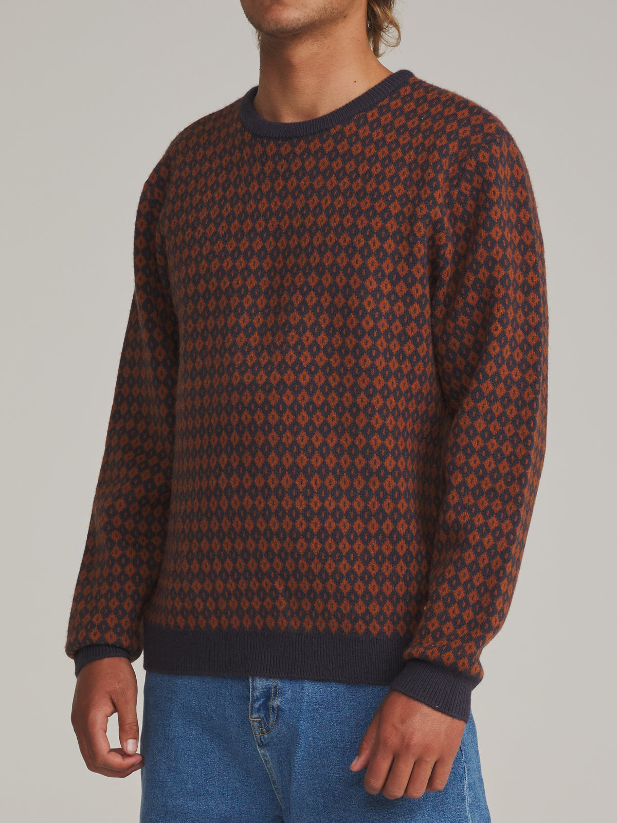 Katin Check Sweater in Rust/Navy - worn on model, side