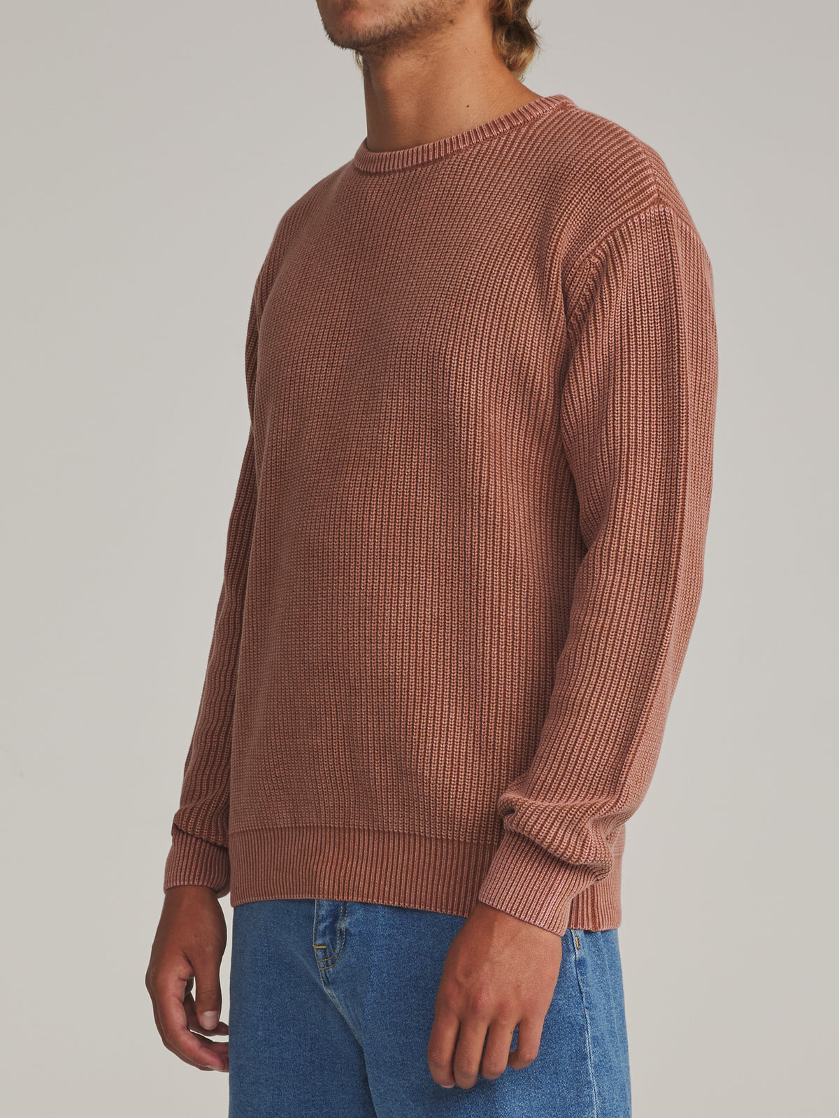 Katin Swell Sweater in Rust - worn on model, side