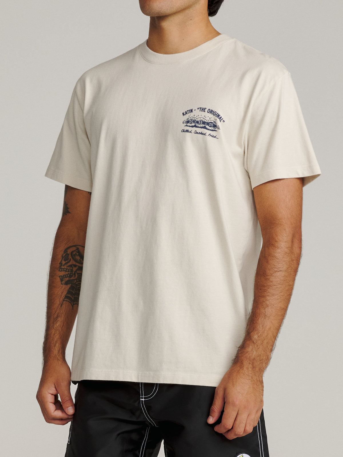 Katin Shuck Tee in Vintage White midweight jersey, on model, side #color_vintage white