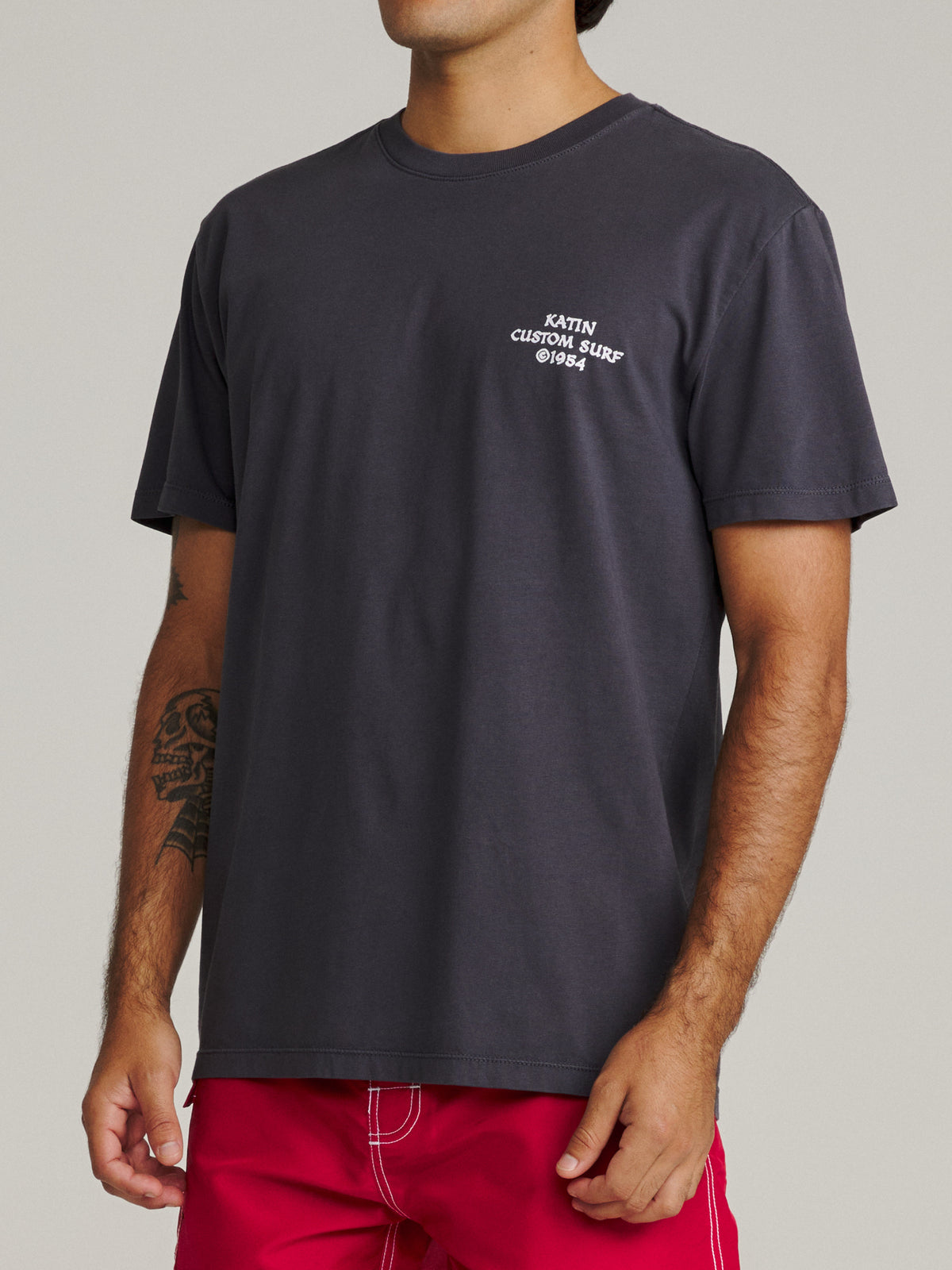 Katin Spell Tee in Polar Navy Vintage Wash, on model, side #color_polar navy vintage wash