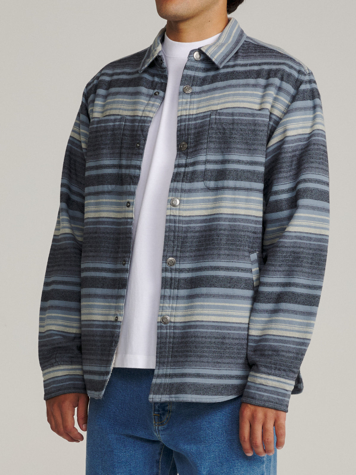 Katin Harold Stripe Shirt Jacket in Navy midweight brushed flannel, on model, side #color_navy
