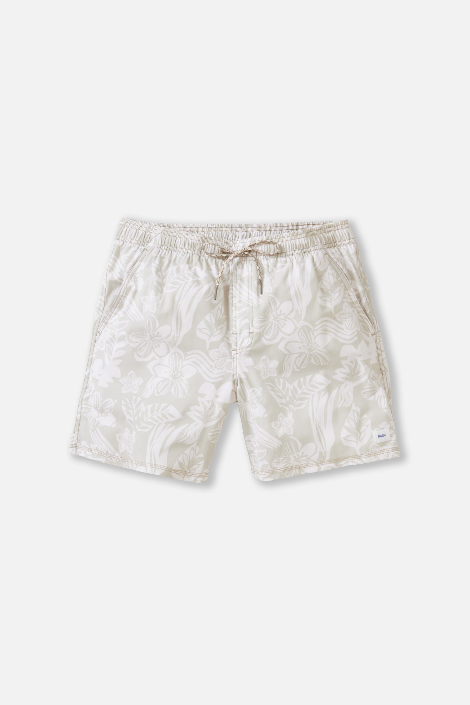 Beige shorts with a subtle pattern on a white background