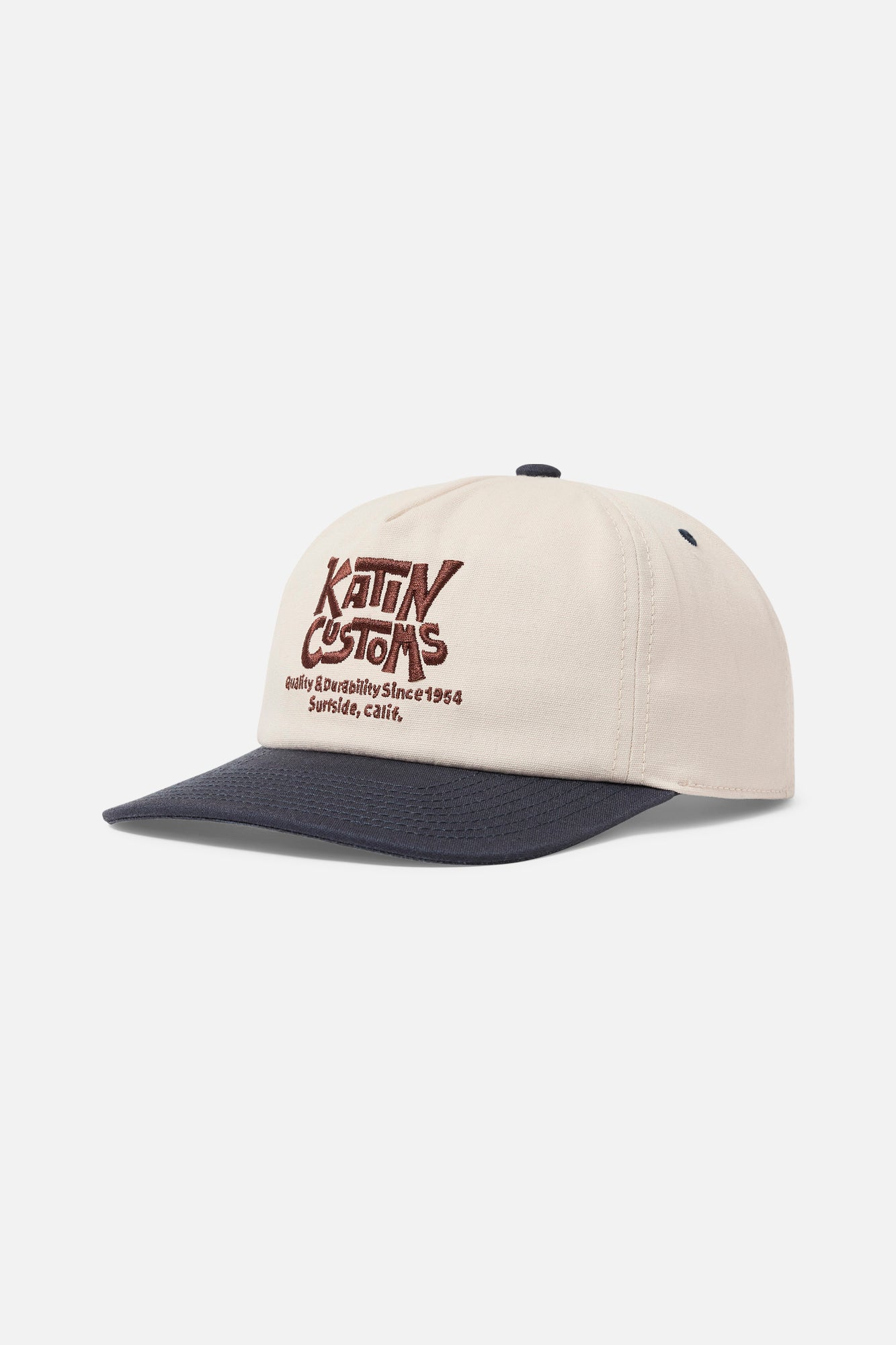 Beige and navy cap with 'Katin Customs' logo on a white background