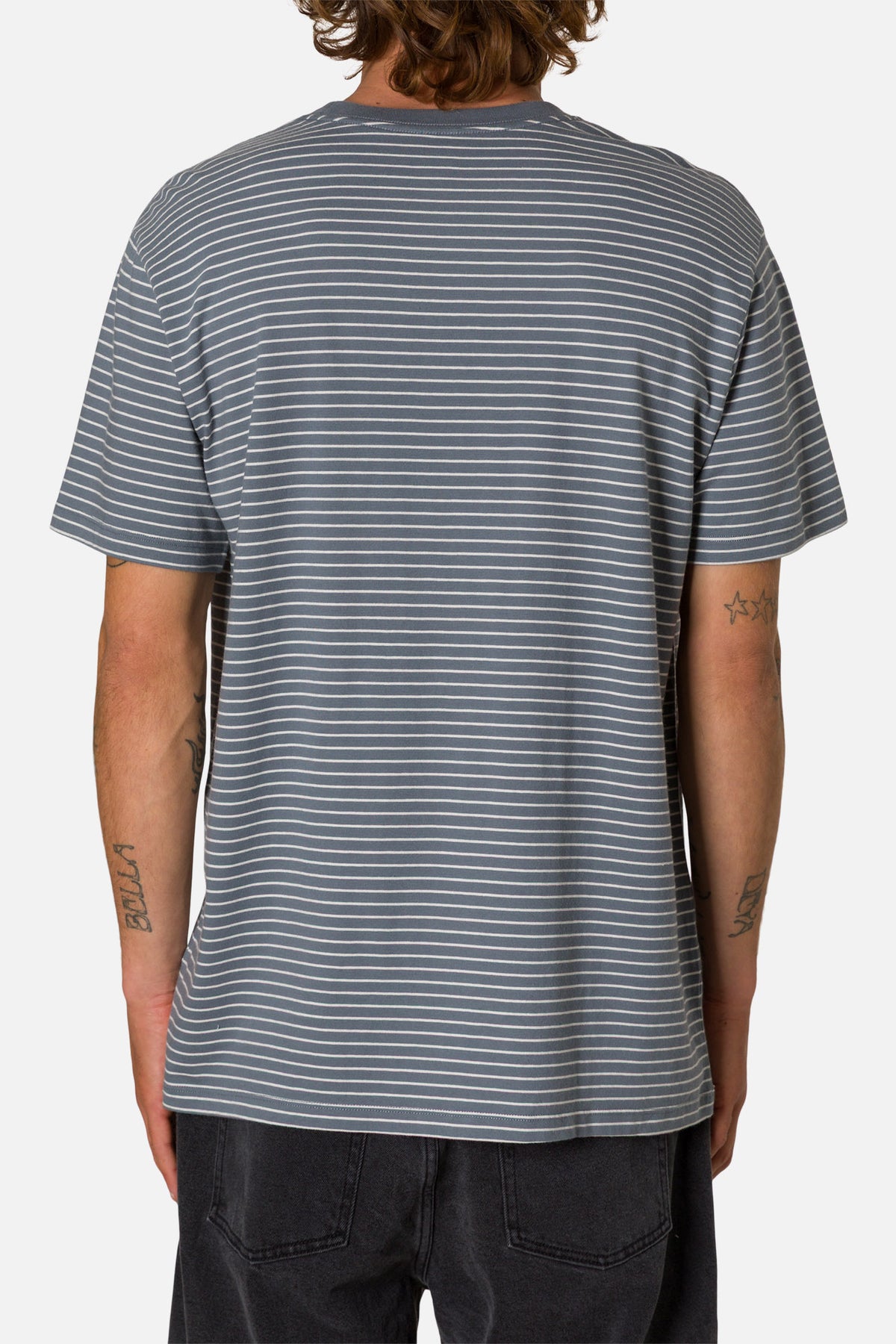 Person wearing a gray striped t-shirt on a white background