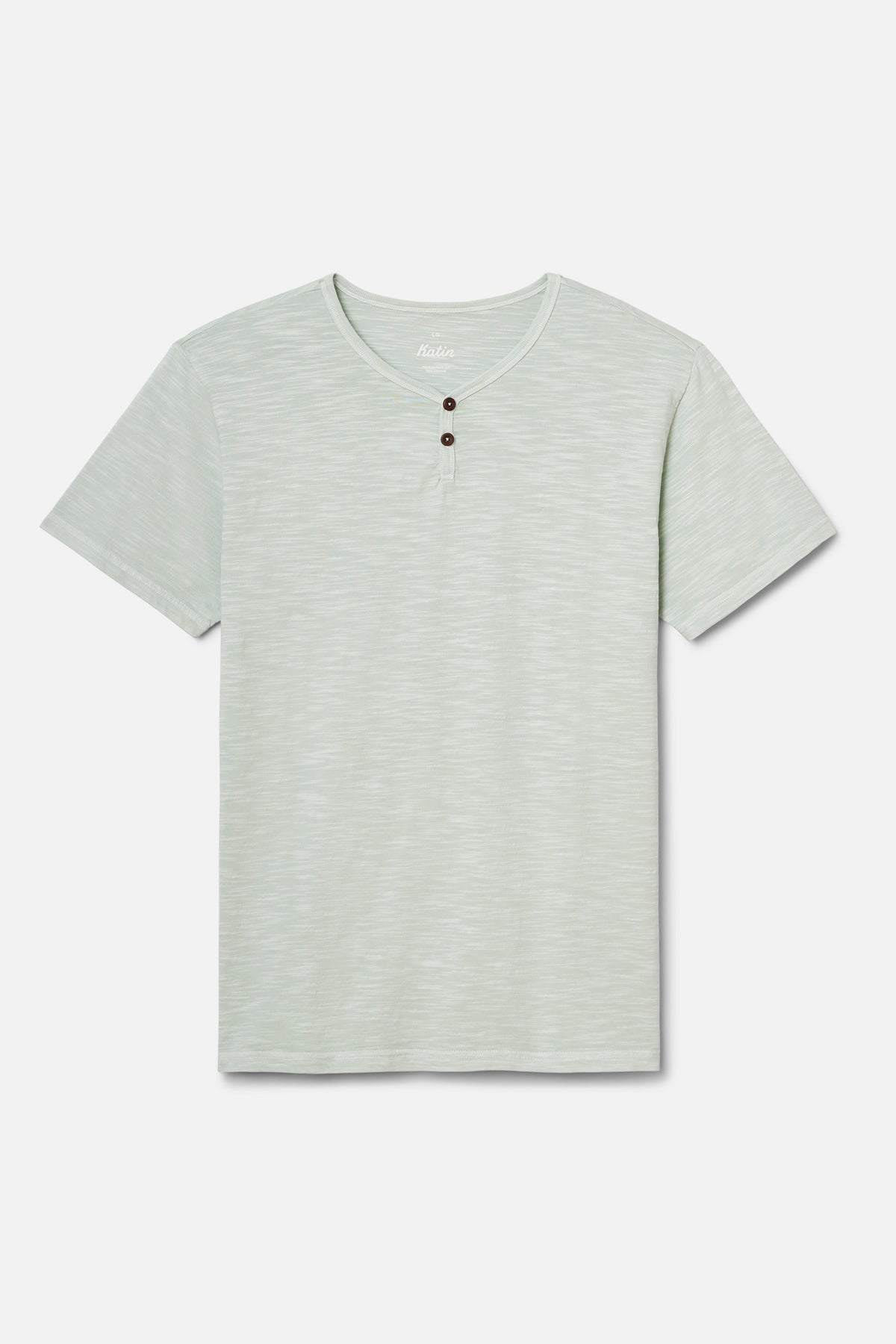 Light green henley shirt on a white background
