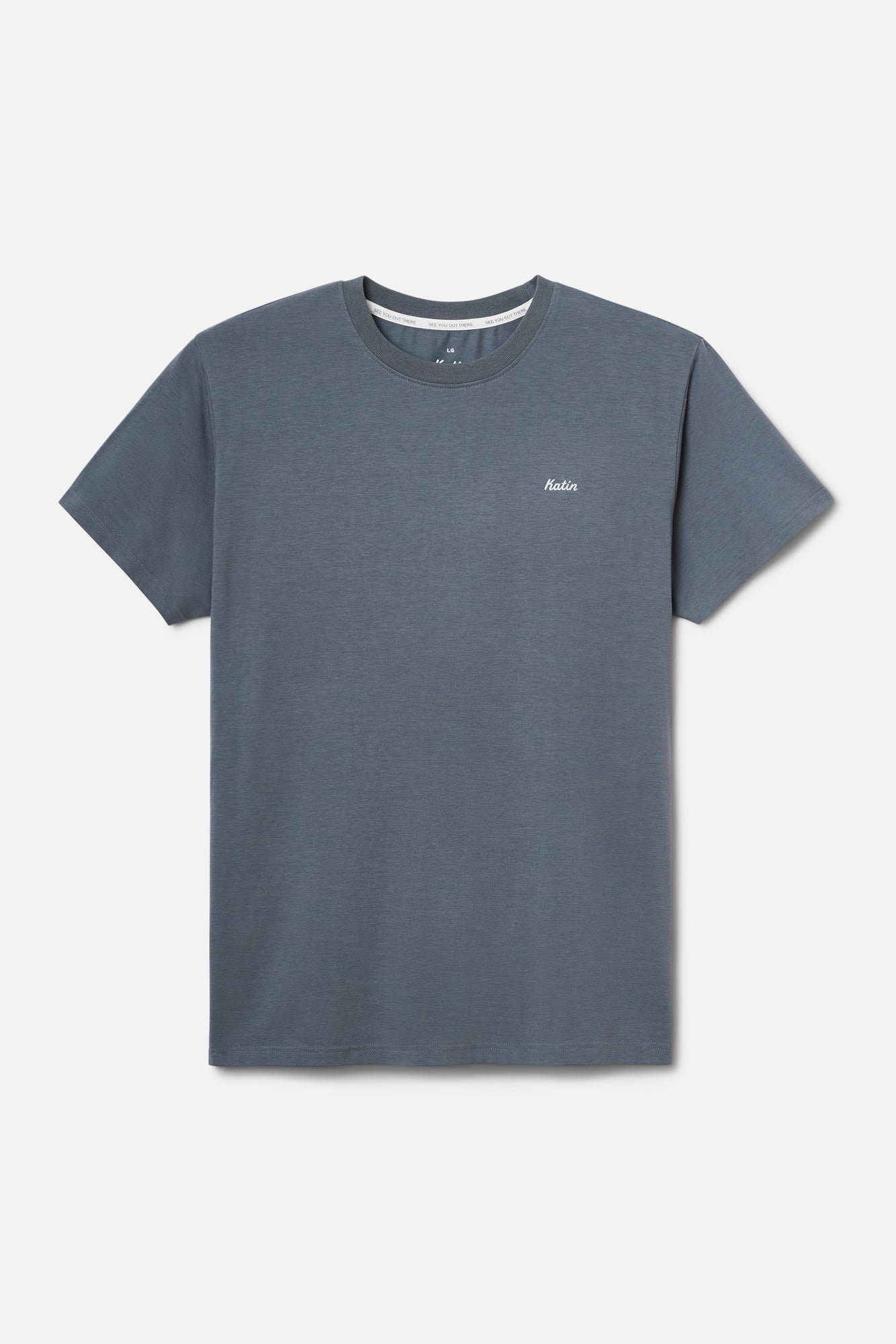 Blue t-shirt with a small logo on a light gray background