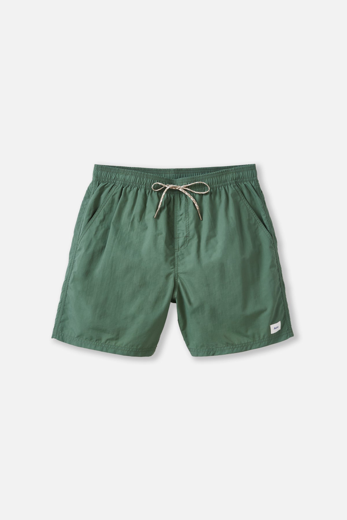 Green shorts with a drawstring on a white background