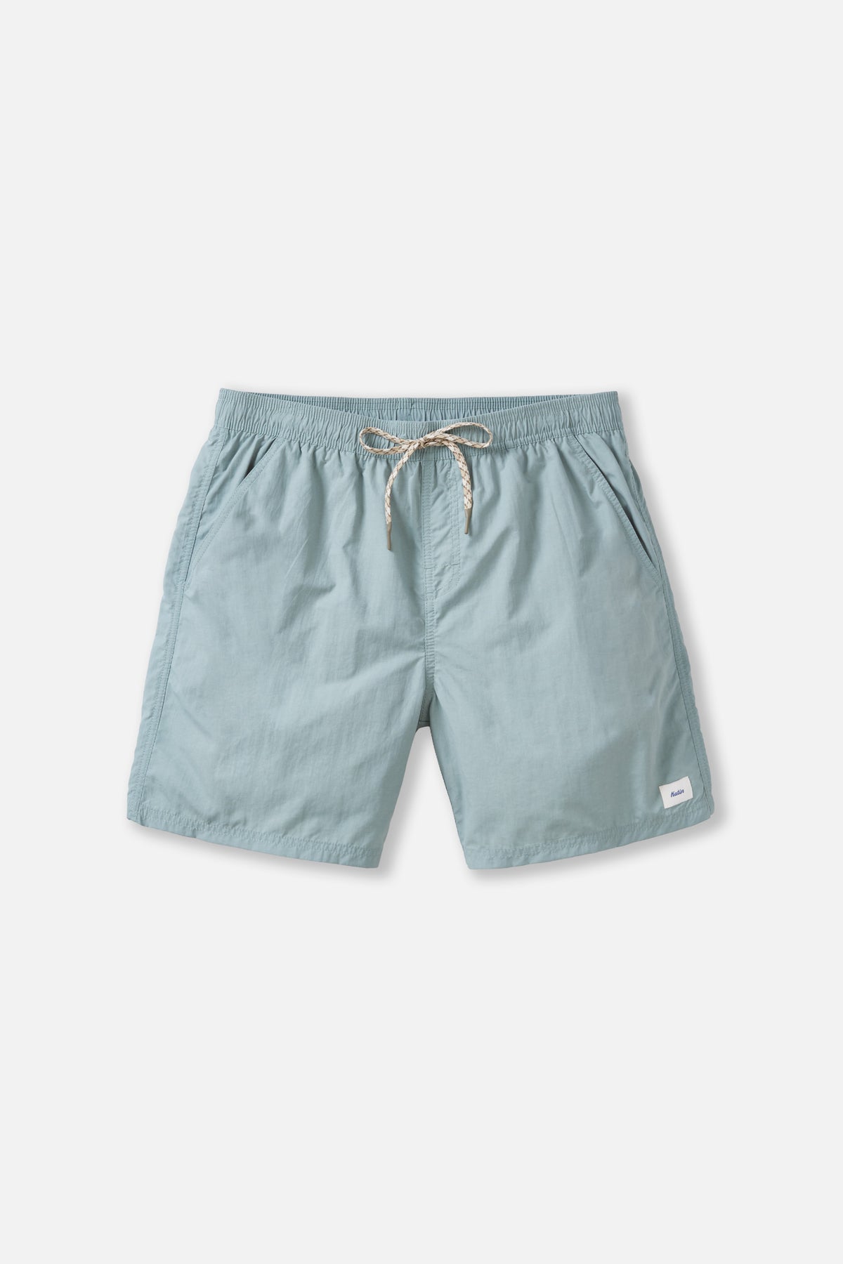 Light blue shorts with a drawstring on a white background