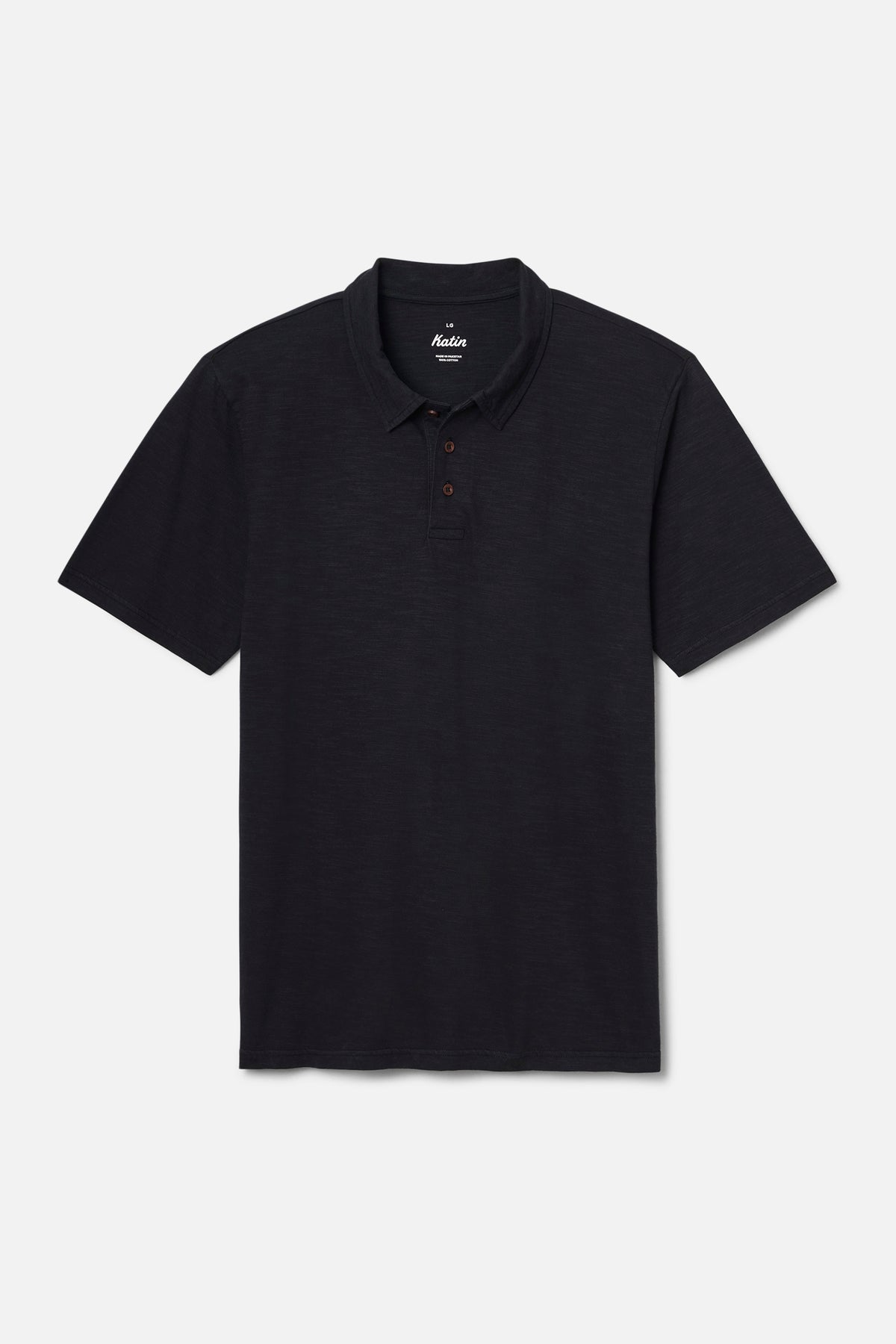 Black polo shirt on a light gray background