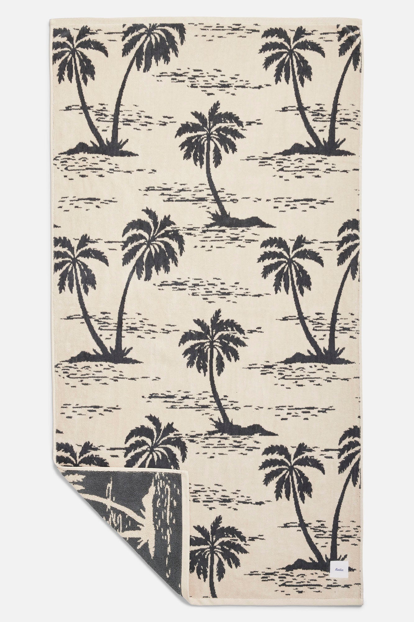 Vapor towel with black palm tree pattern