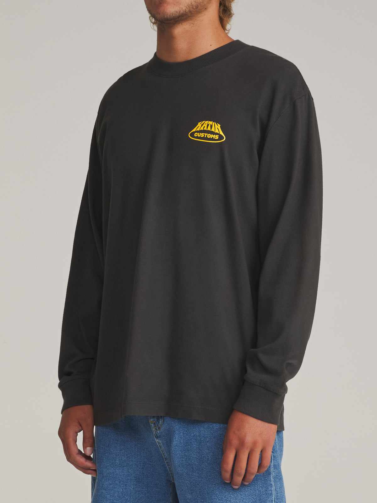 Katin Voyager Box Fit Ls Tee in Black Wash - worn on model, side
