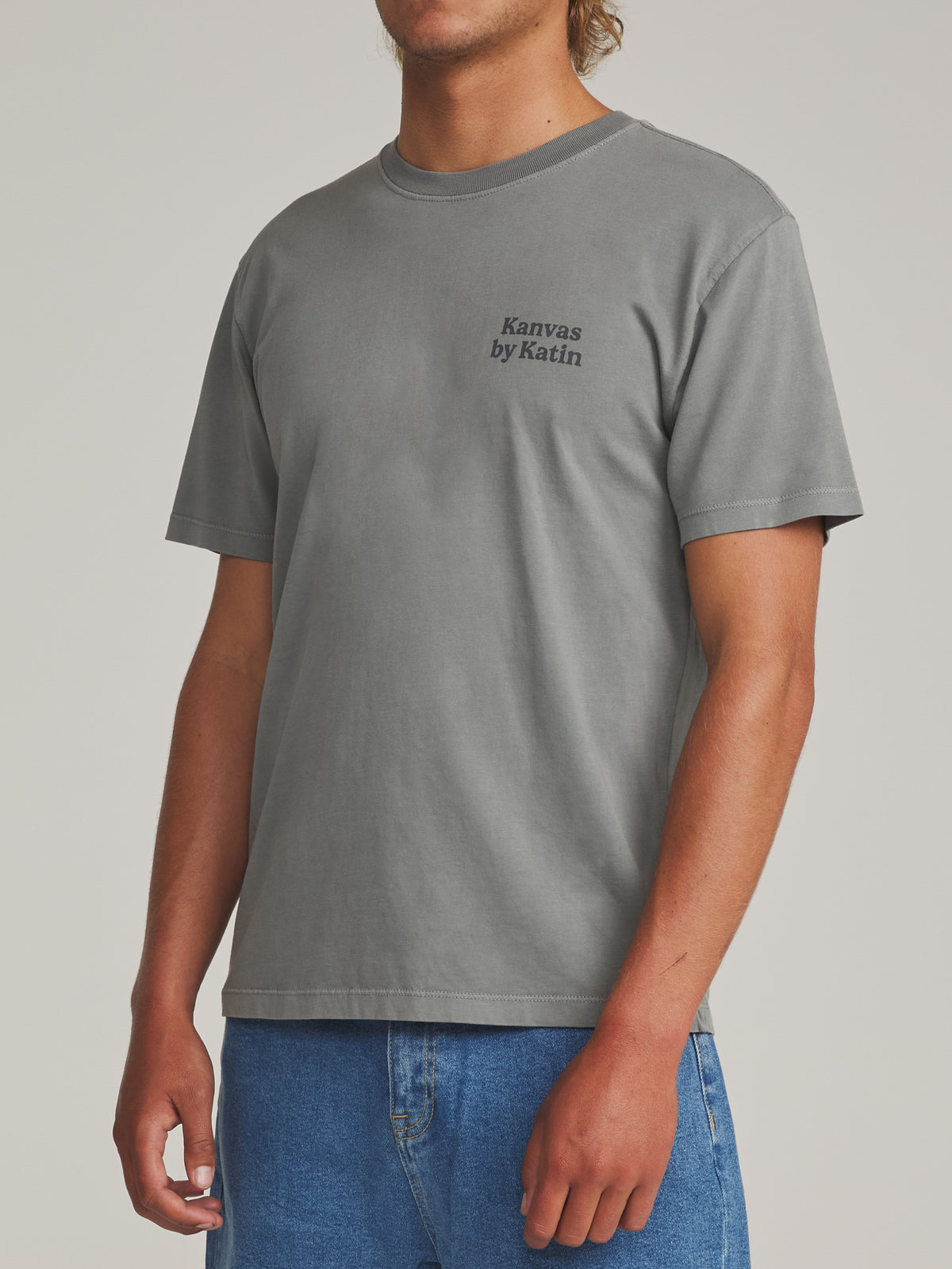 Katin Carve Tee in Graphite Vintage Wash - worn on model, side