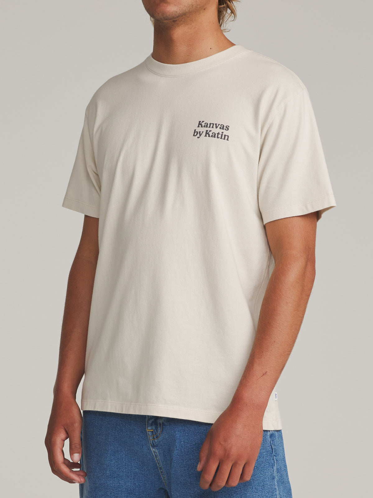 Katin Carve Tee in Vintage White - worn on model, side
