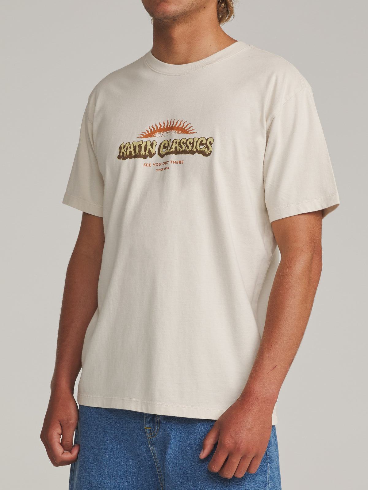 Katin Glow Tee in Vintage White - worn on model, side