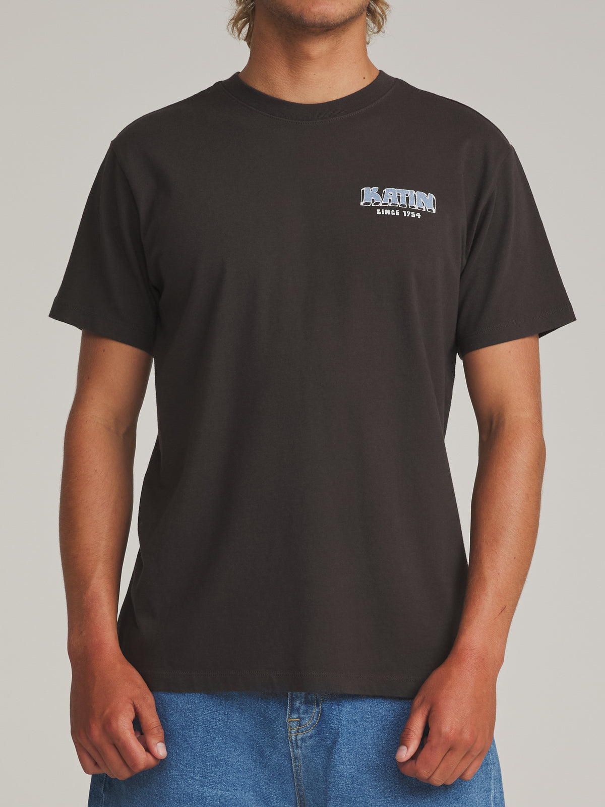 Katin Middles Tee in Black Wash - worn on model, front