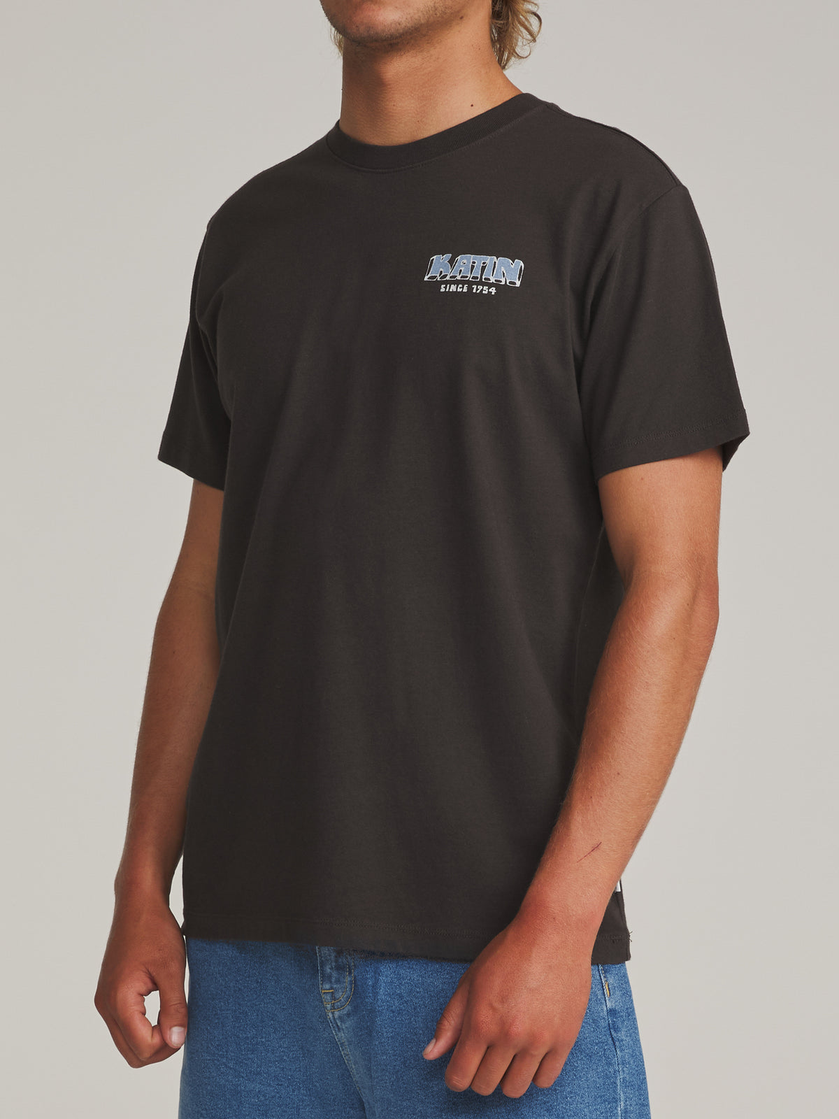 Katin Middles Tee in Black Wash - worn on model, side