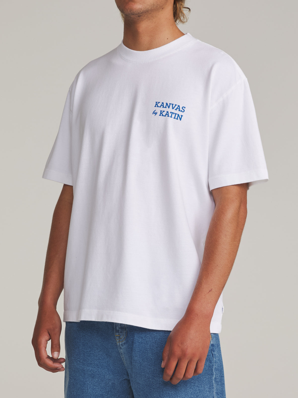 Katin Pipe Box Fit Tee in White - worn on model, side
