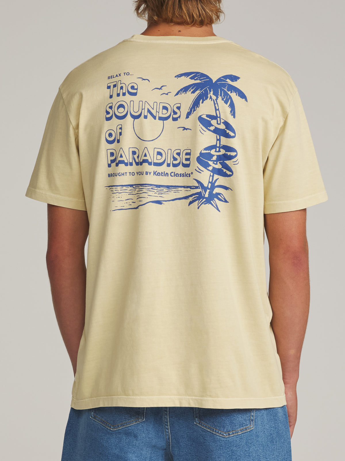 Katin Sonics Tee in Dusty Yellow Vintage Wash - worn on model, back