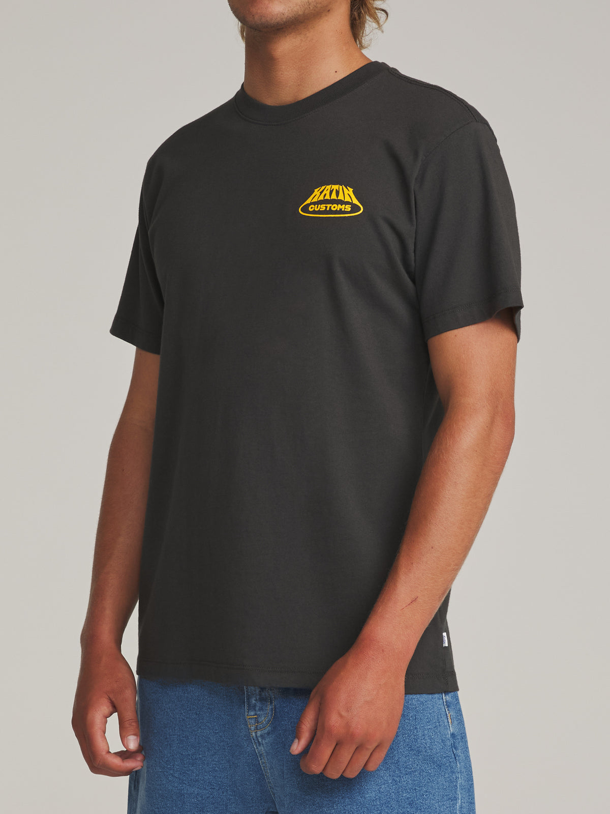 Katin Voyager Tee in Black Wash - worn on model, side