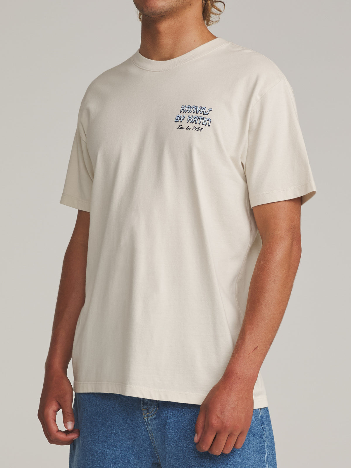 Katin Yesterday Tee in Vintage White - worn on model, side