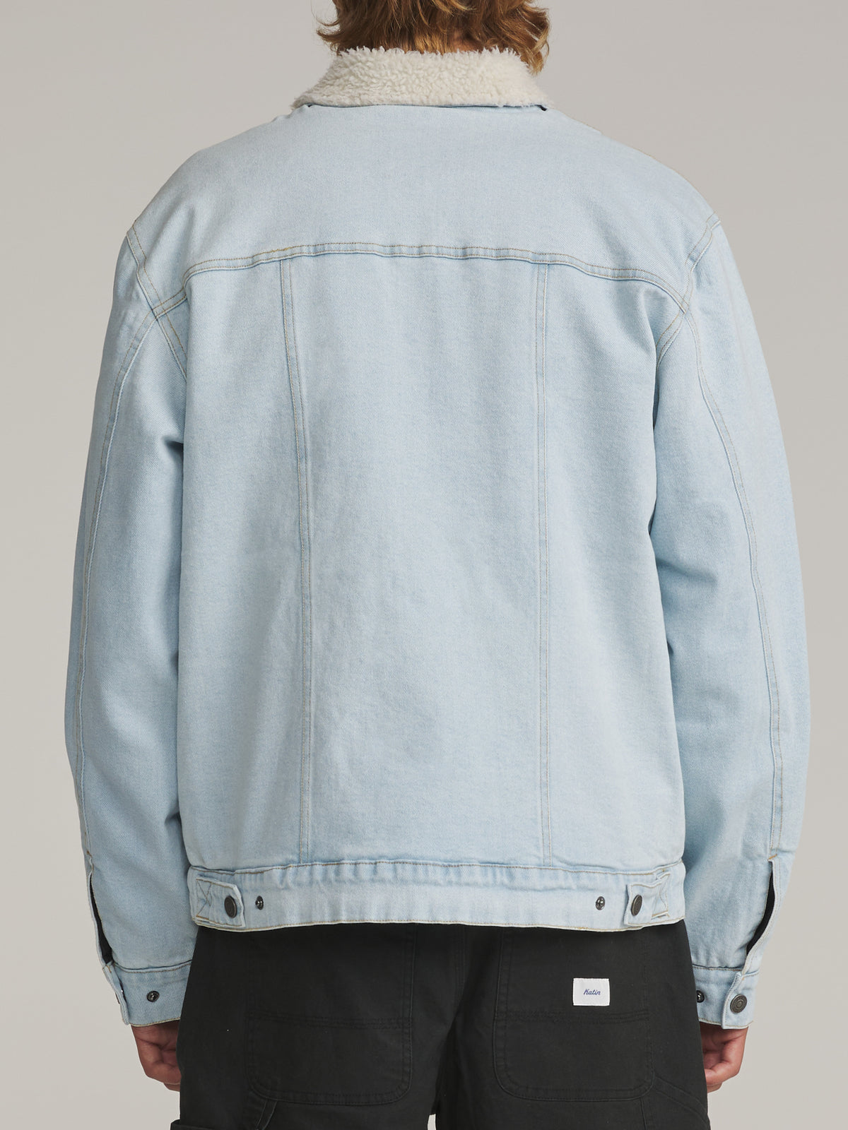 Katin Harris Denim Jacket in Light Indigo - worn on model, back