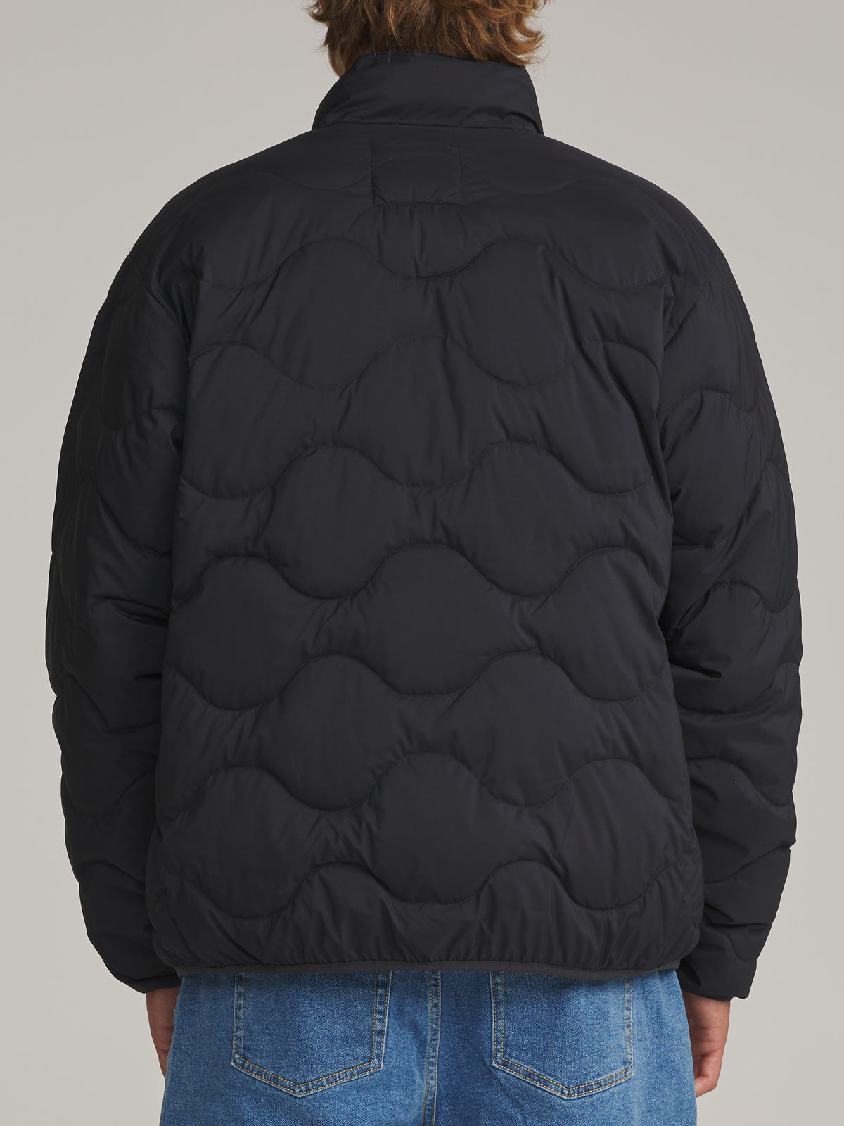 Katin Otg Ross Puffer in Black - worn on model, back