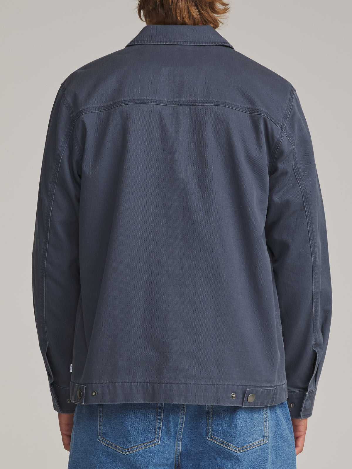 Katin Petrol Jacket in Washed Blue - worn on model, back