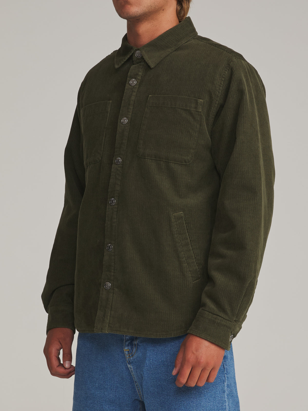 Katin Harold Corduroy Shirt Jacket in Dark Olive - worn on model, side alternate