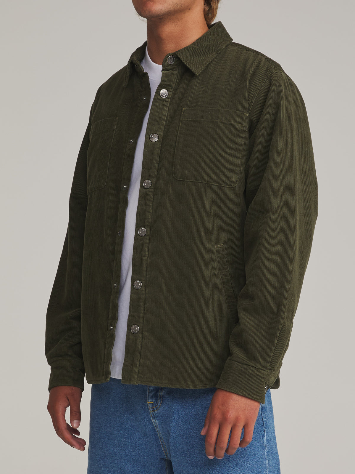 Katin Harold Corduroy Shirt Jacket in Dark Olive - worn on model, side