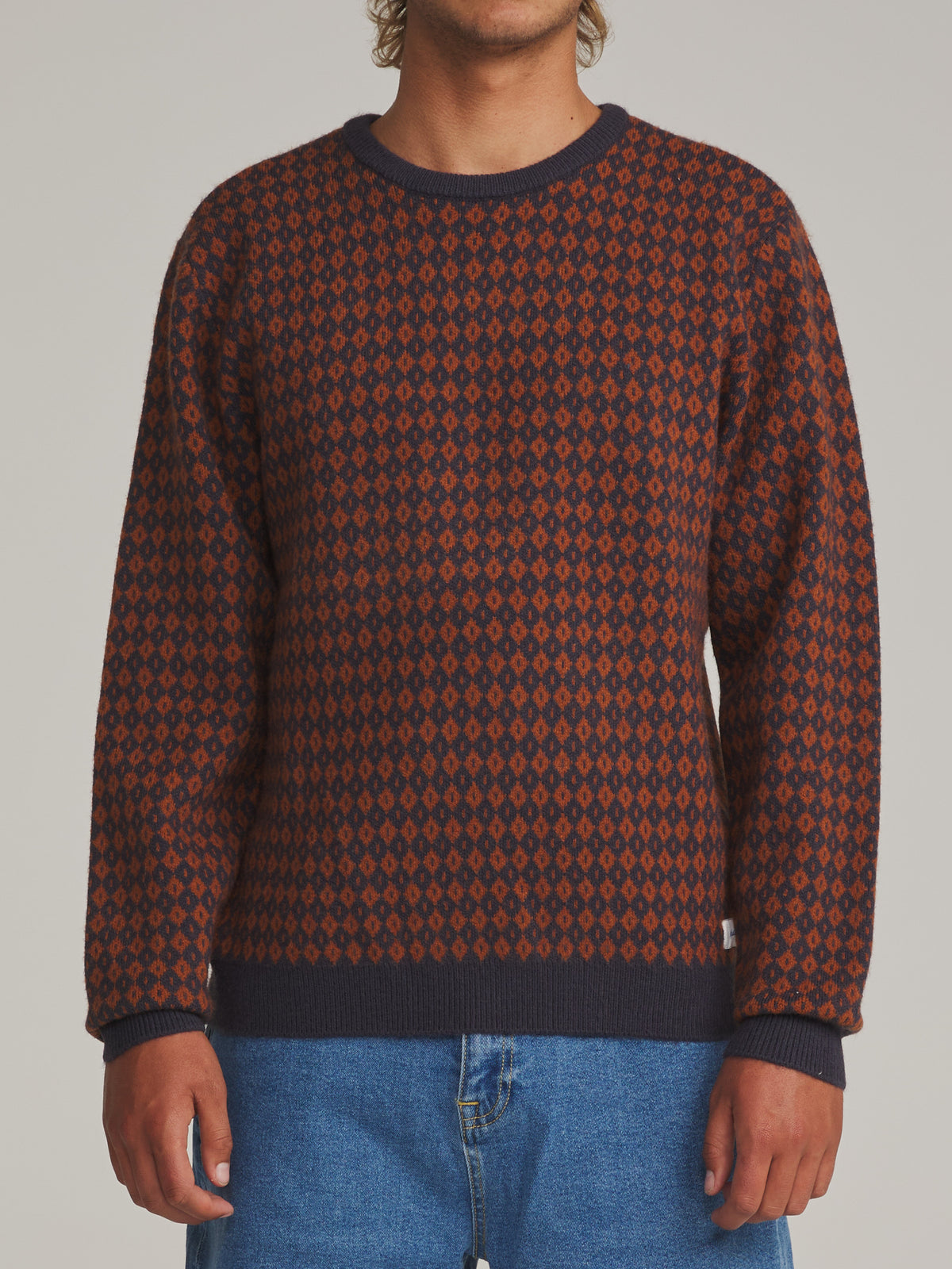 Katin Check Sweater in Rust/Navy - worn on model, front