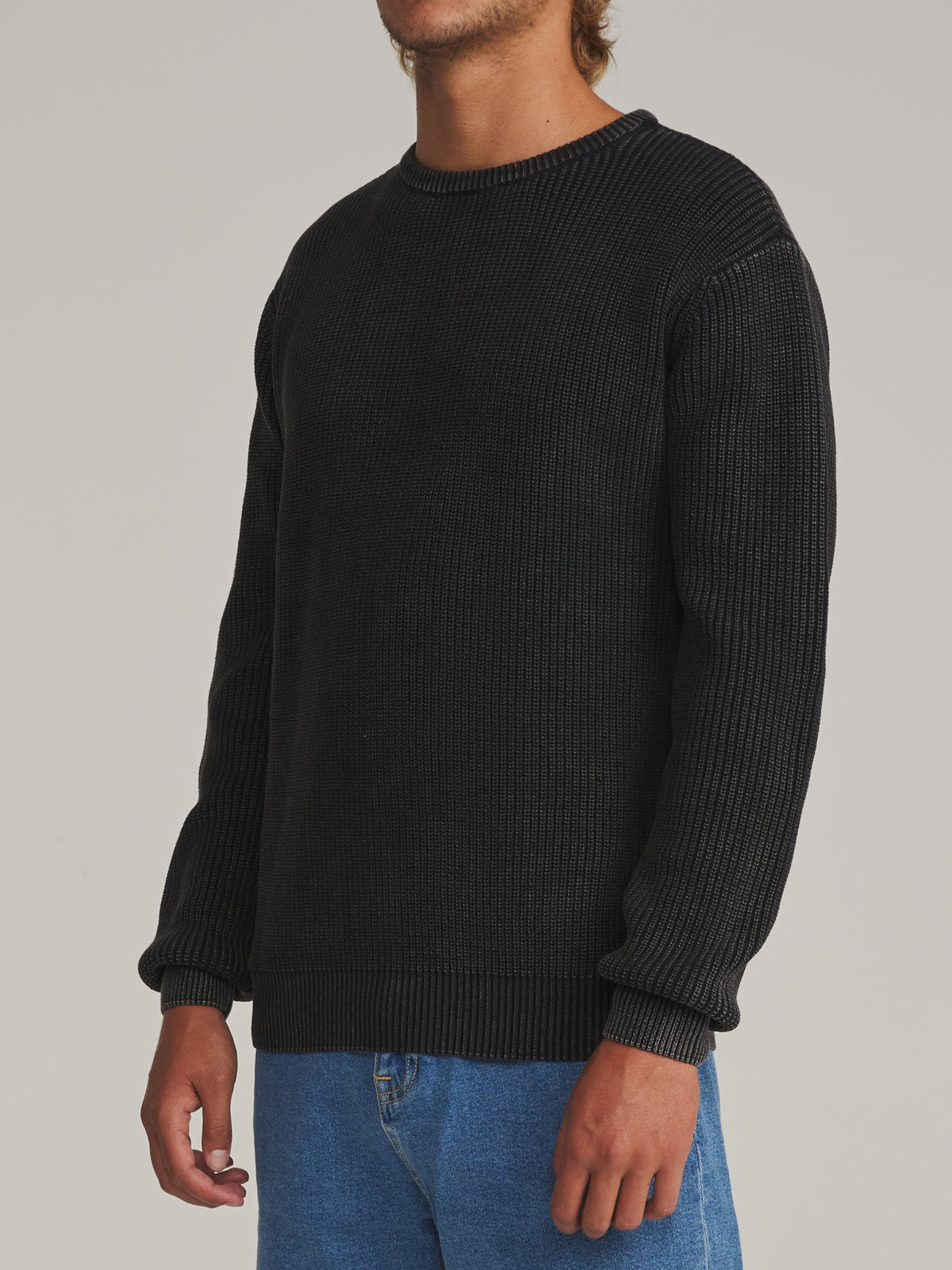 Katin Swell Sweater in Black Wash - worn on model, side