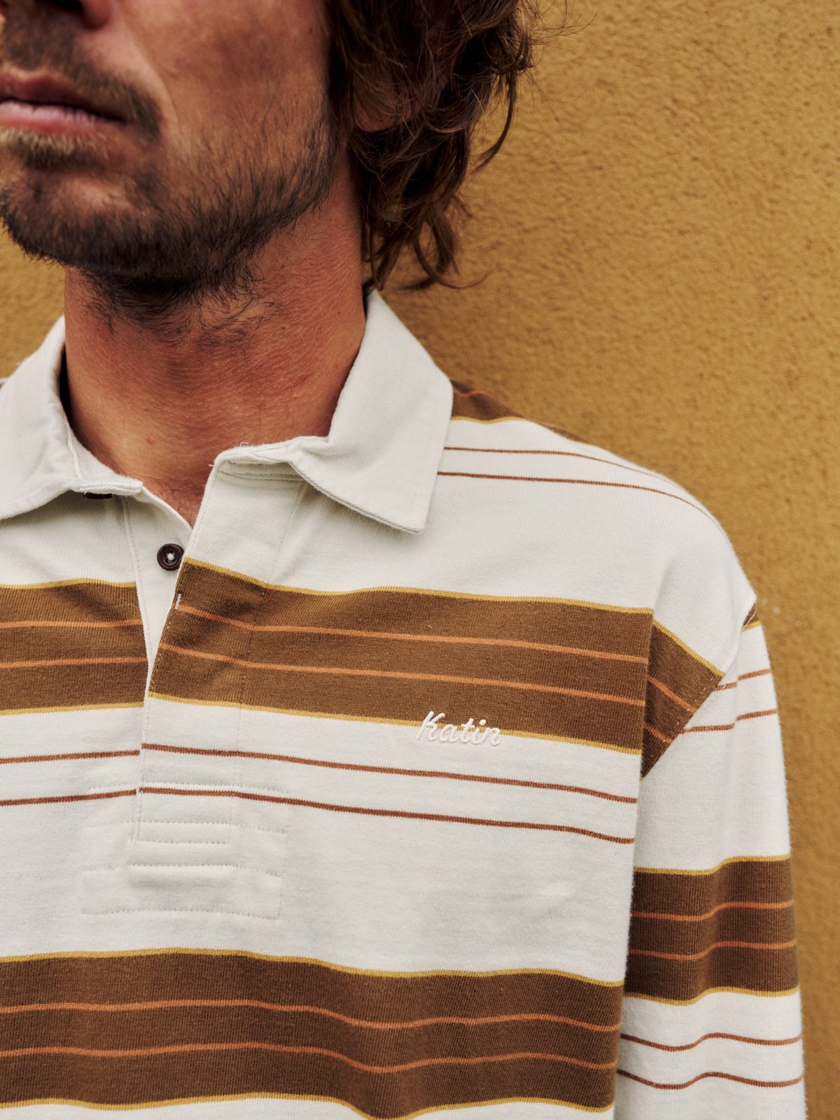 Katin Greg LS Rugby Polo in Vapor, yarn-dyed stripe jersey with Katin script embroidery, on model, detail #color_vapor