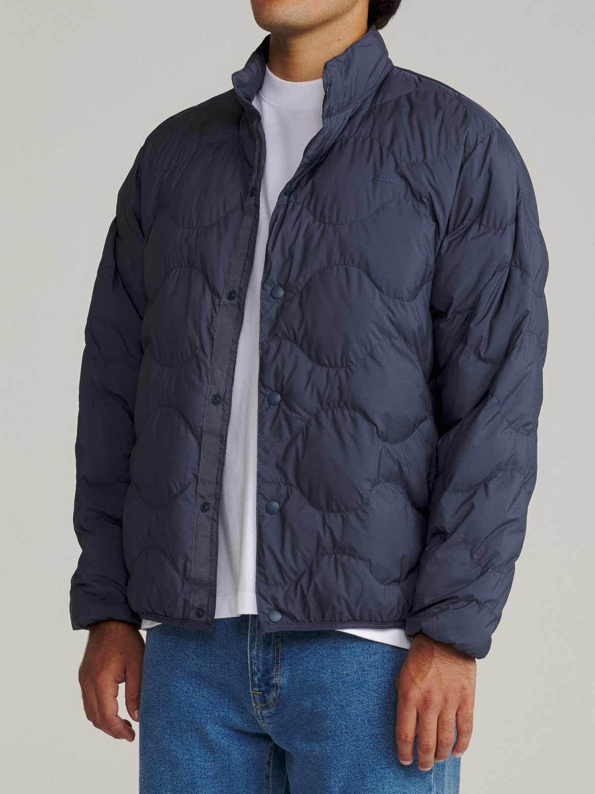 Katin OTG Ross Puffer in Washed Blue with an onion quilt pattern, on model, side #color_washed blue